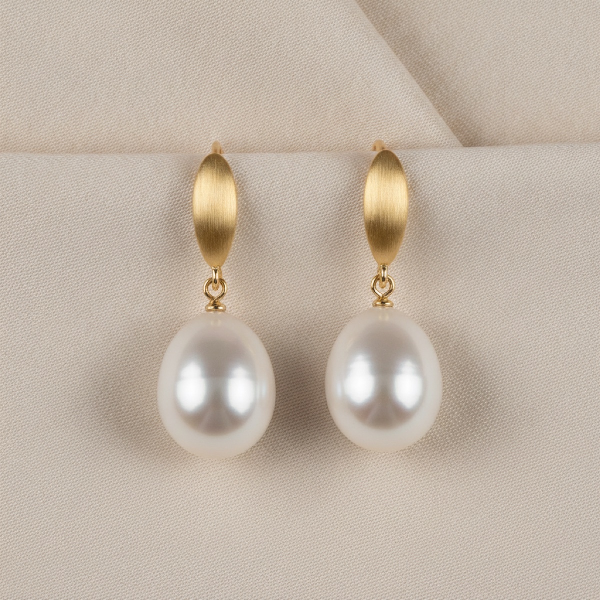 Kimberley Drops — A matched pair of 13mm South Sea drops on brushed gold hooks.